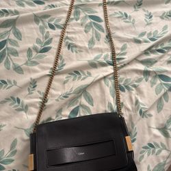 Chloé Medium Elle chain clutch in black lambskin leather