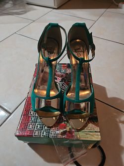 High Heels With Golden Bow