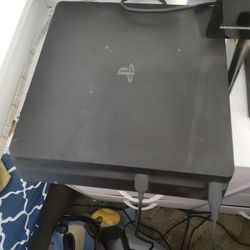 PS4 Slim Edition (Controllers and Video Games included!)