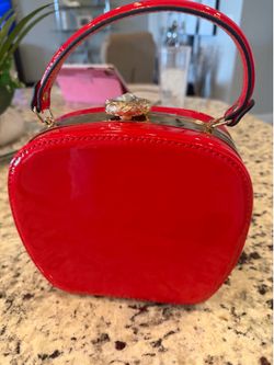 RED PATENT HANDBAG