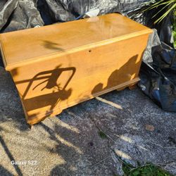 large wooden trunk.