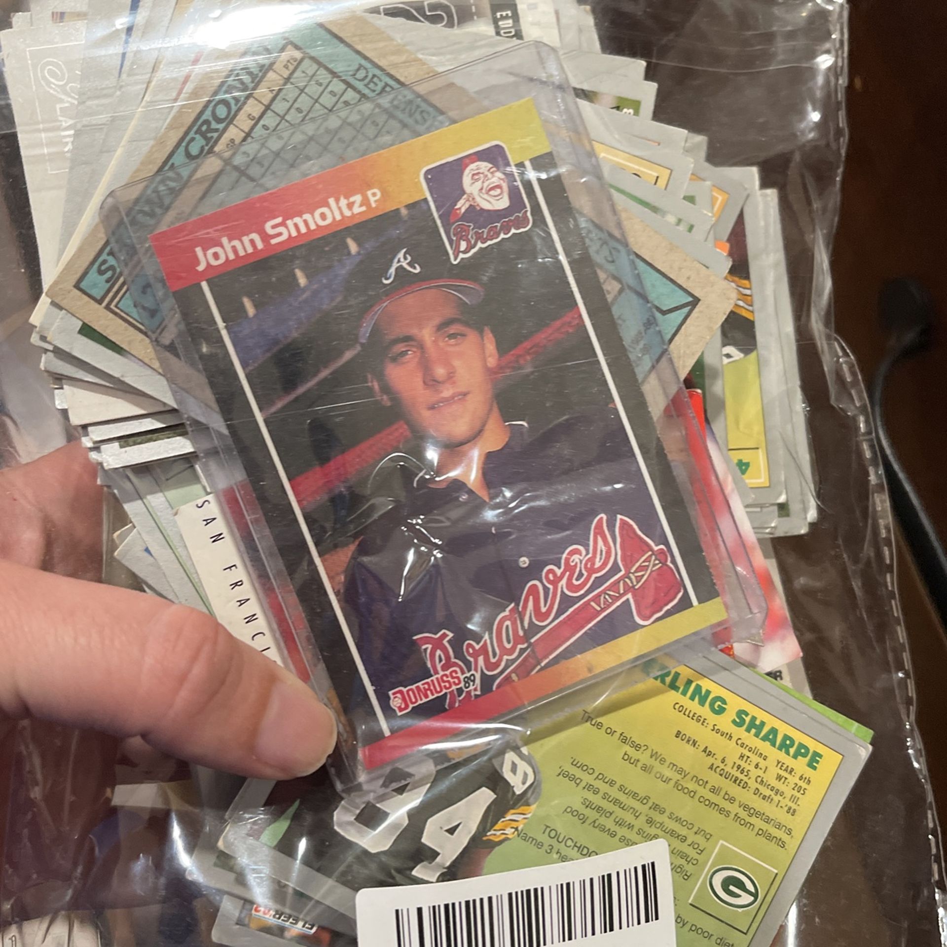Small Bag Of Baseball And Football Cards