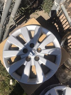 1 Nissan Sentra hubcap {contact info removed}” NEW hubcap