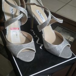 Glittery. Silver Color Heels #10  $8