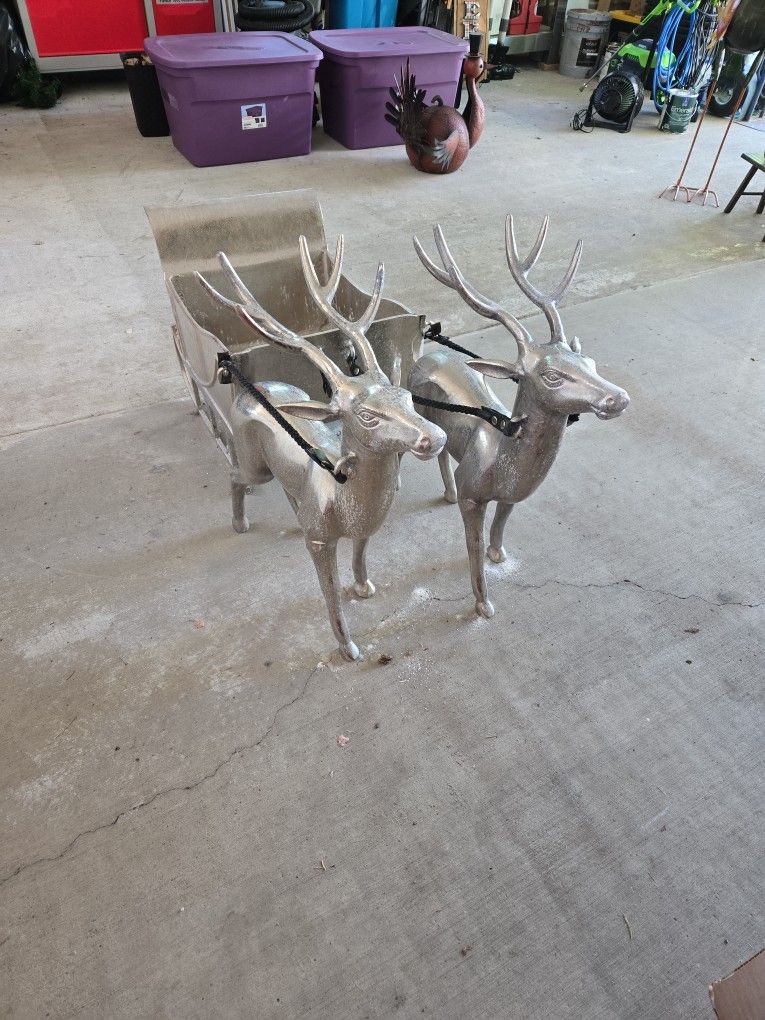 Solid Sleigh And Reindeer Holiday Decoration