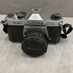 Pennex K 1000 SE 35 mm camera with 50 mm lens
