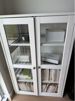 Ikea glass and wood bookshelf