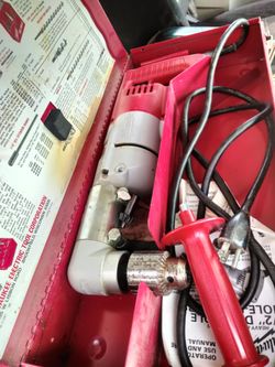 Milwaukee half inch Chuck drill angle looks great comes with Chuck key and book and hard box