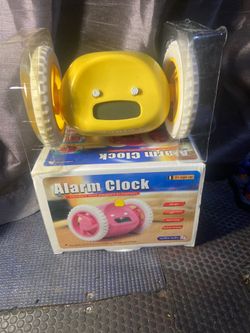 Alarm clock on wheels
