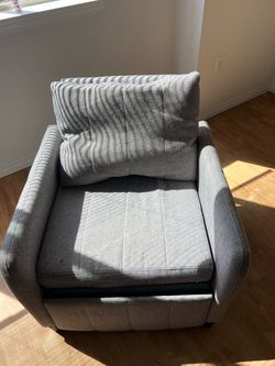 Fold out chair/ bed