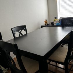 Black Dining Table (Moving sale)  Includes Chairs 