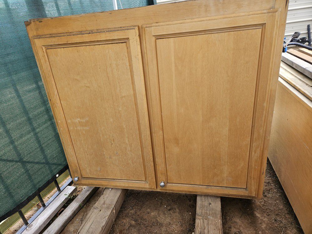 2  - upper kitchen cabinets ,3 x 4 "@ 4x4" used fair condition for a Garage storage, $30,obo