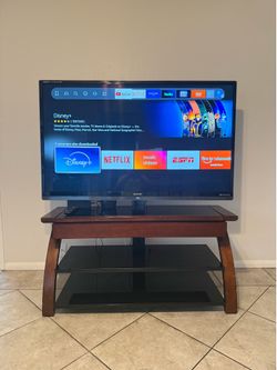 Sharp Aquos TV and Wood TV Stand