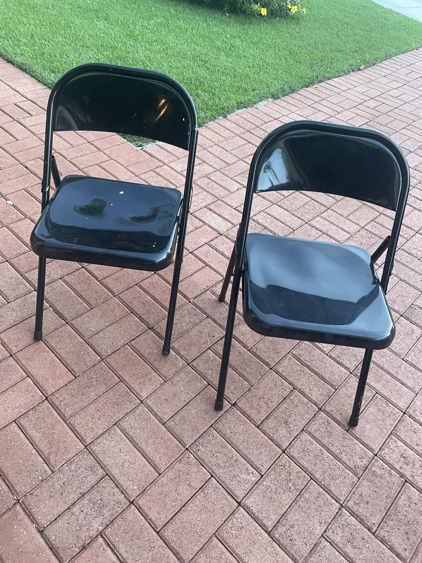 2 Black Folding Chairs