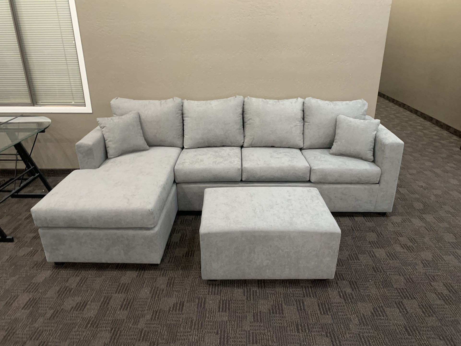 Grey Sectional And Ottoman