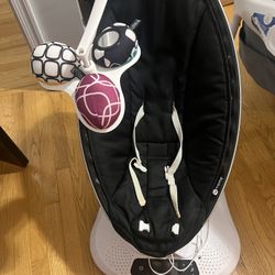 4 Moms Motion Rocker And Some Bab Girl Clothes 