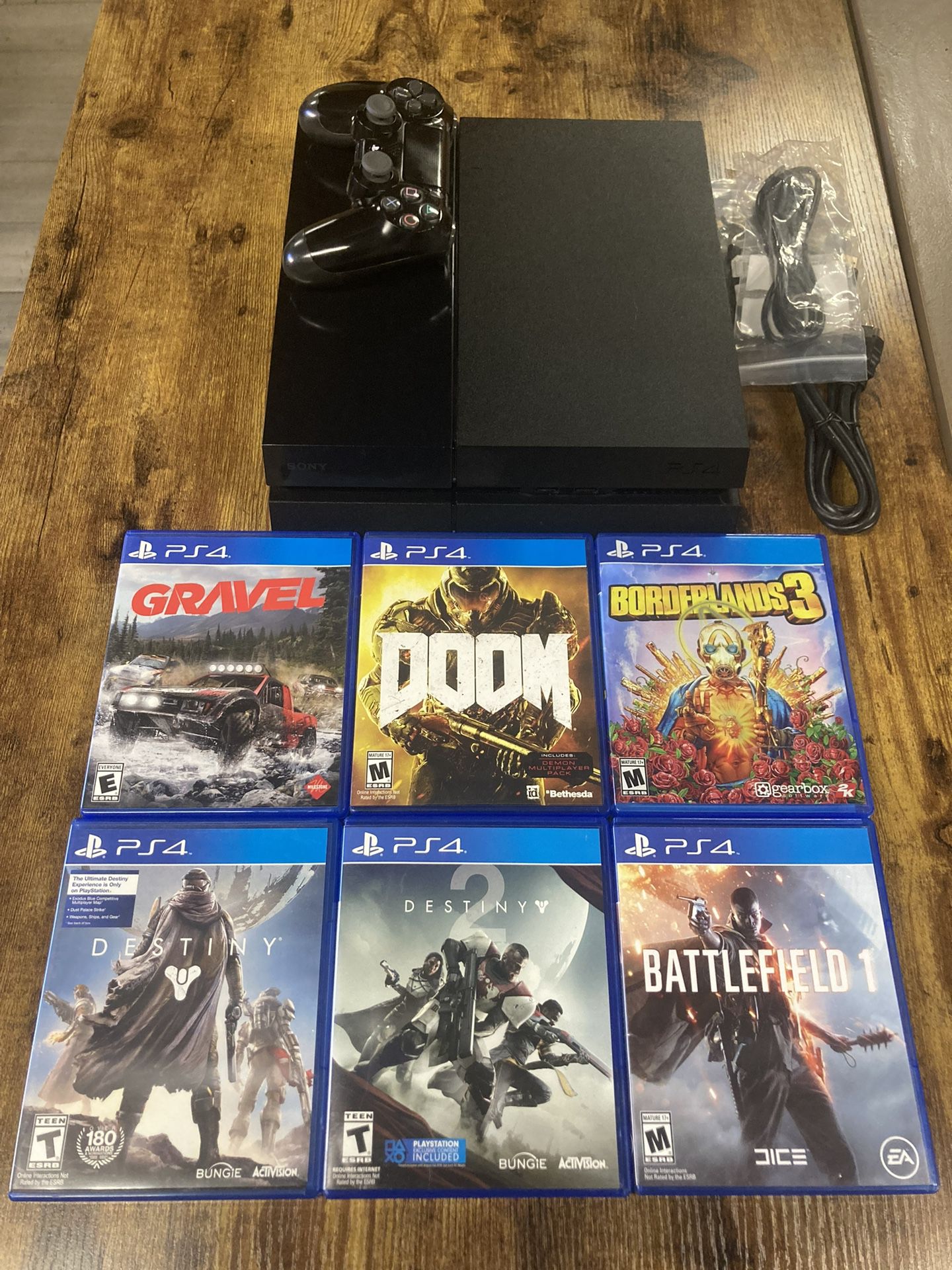 Play Station 4 500GB PS4 in Perfect Condition With 6 Games Controller Wires Ready To Play