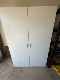 White wooden storage cabinet