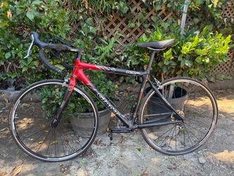 Giant TCR C2 carbon road bike in red and black