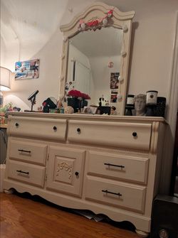 Furniture: Wood desk,.dresser with mirror, shelving