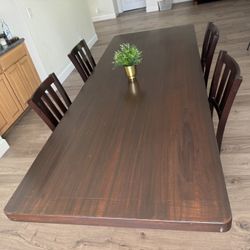 LOWER PRICE NOW Dining Table  -solid wood with 8 Chairs (4 showing)