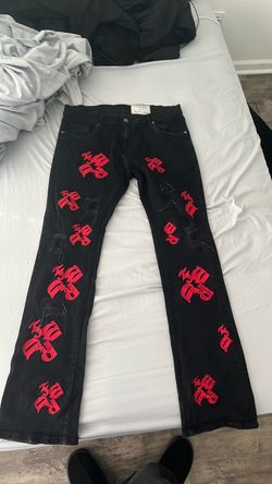 FWRD black and red denim stacked jeans