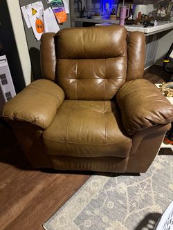 Brown Leather rocker/ Recliner