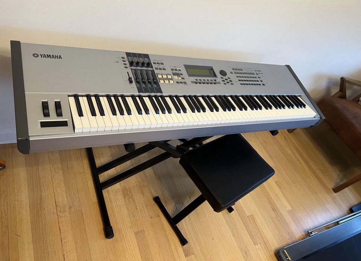 Yamaha Motif ES8 keyboard with bench, stand, and foot pedal