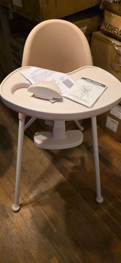 Brand new out the box and assembled Highchair