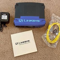 Working Linksys Etherfast Router With 4 Port And AC Adapter Cable BEFSR41 v.2 With CD Included