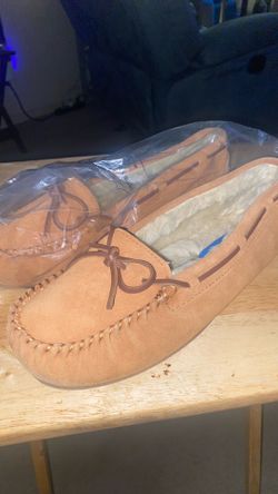 Woman’s brown suede moccasins