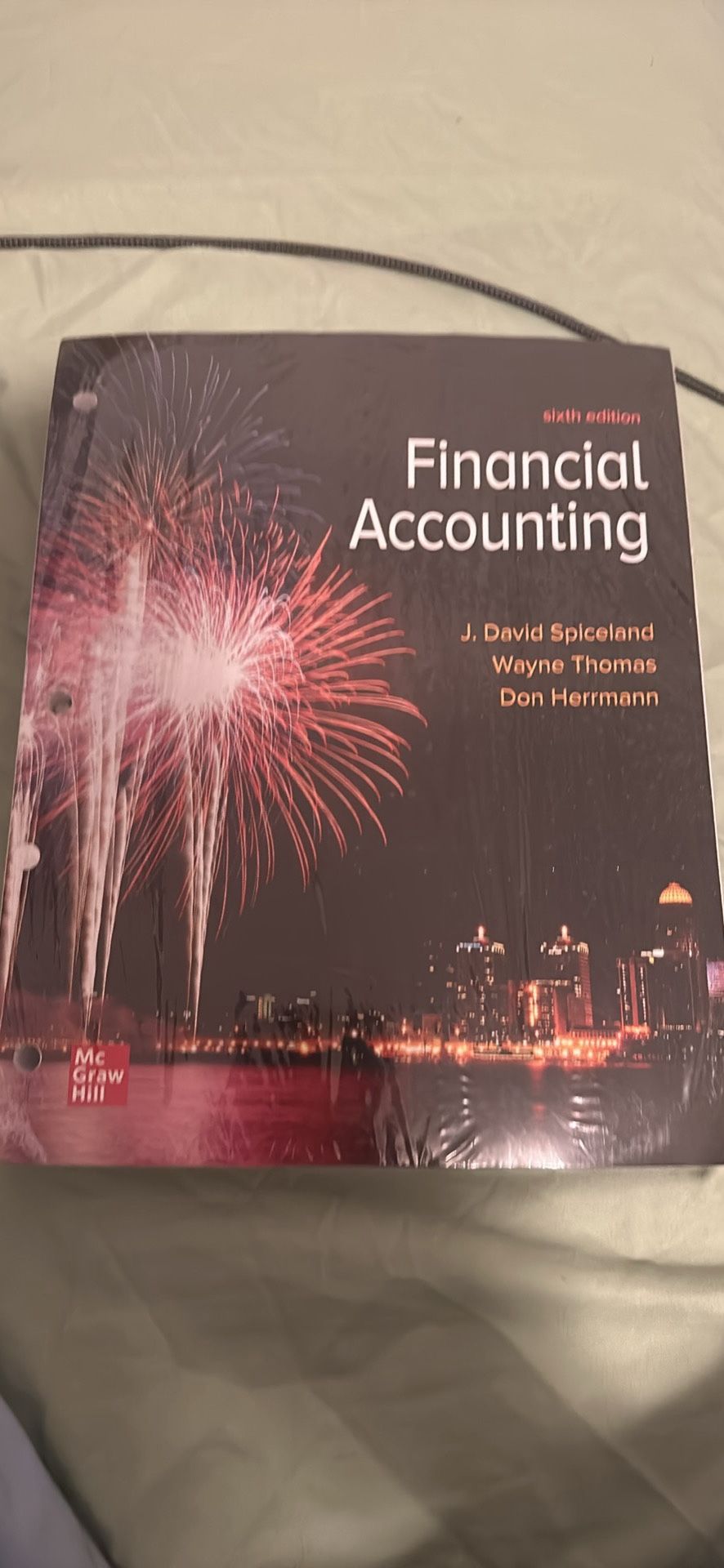 Financial Accounting by Wayne M. Thomas, David Spiceland and Don 6th Edition