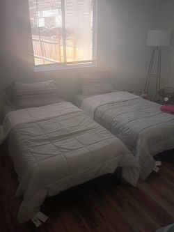2 twin brand new beds with mattresss