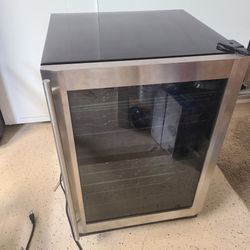 Magic Chef model MCWBC77DZC beverage cooler.