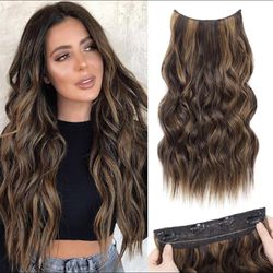 Human hair blend invisible wire hair extensions with 4 secure clips.