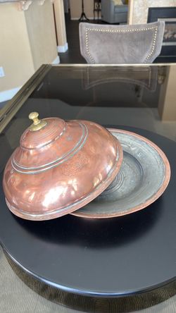 vintage Middle Eastern or Turkish handcrafted copper serving dish with a domed lid and a brass finial knob.