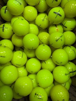 Taylormade yellow distance golf balls $10 for 15 balls