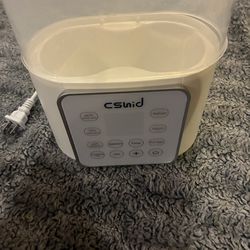 Multi use bottle warmer