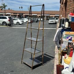 4-tier ladder bookshelf featuring a metallic gold frame