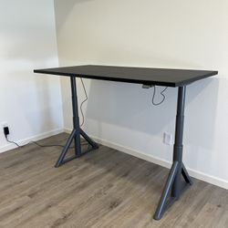 Ikea IDÅSEN Desk sit/stand, black 63x31 1/2 "