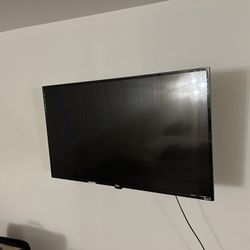 50” TLC Roku TV With Wall Mount