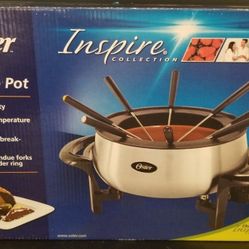 New. Oster 3 quart Inspire Fondue set.