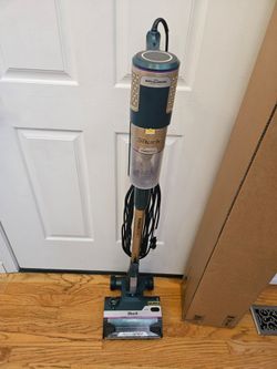 SHARK VACUUMS  WITH AMAZING POWER SUCTION. WORKS EXCELLENT. IN THE BOX