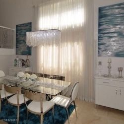 Modani, leather Sofa, 7” long dining room set, with 2 side china and Z Gallery wall picture