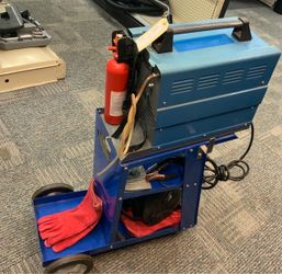 Chicago electric dual mig 131 wire-feed welder with MiG and flux welding cart and accessories