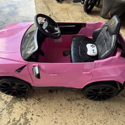 Pink Lamborghini power wheel