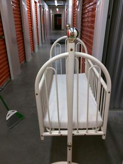 Oval infant crib or swing