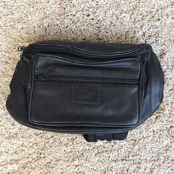 Fanny pack Great for traveling  Goes around waist (adjustable) 