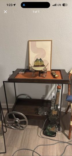 Crate and barrel bar cart with metal wheels