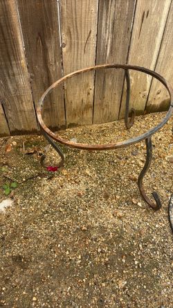 Large metal pot or fire place holder